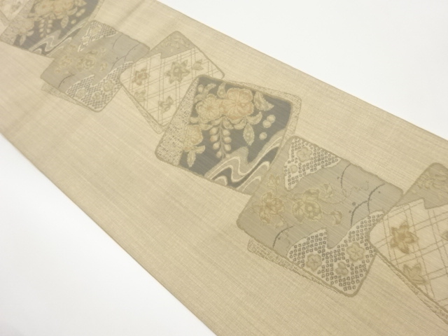 色紙に草花模様織出し袋帯